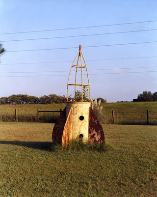 Illustration for article titled The haunting beauty of abandoned playground rockets
